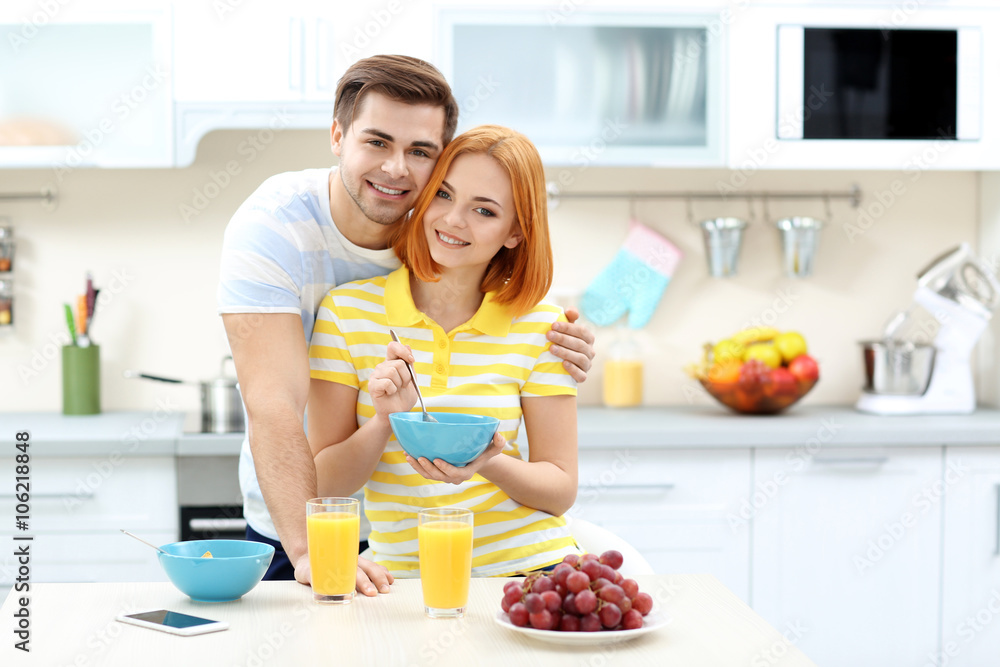 Young beautiful couple have healthy breakfast Young beautiful couple have healthy breakfast