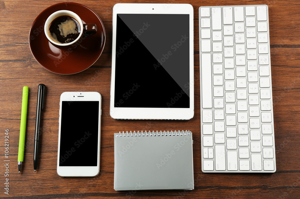 Business desk with equipment, flat lay