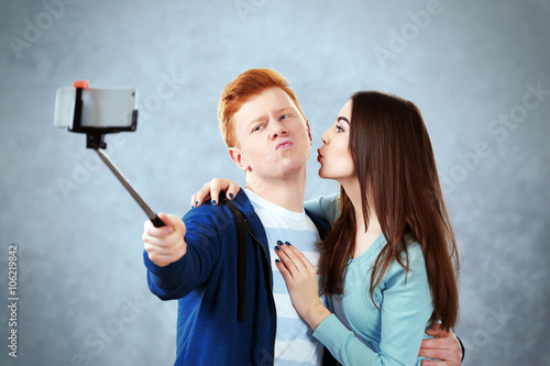 Teenager couple making phot...