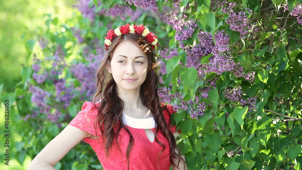 beautiful woman near lilac tree in spring park beautiful woman near lilac tree in spring park