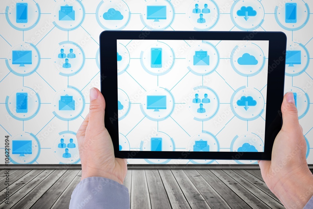 Businessman holding tablet pc with apps Businessman holding tablet pc with apps