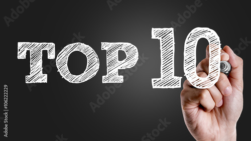 Hand writing the text: Top 10