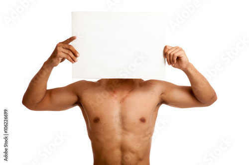 Muscular Asian man with blank sign over  face