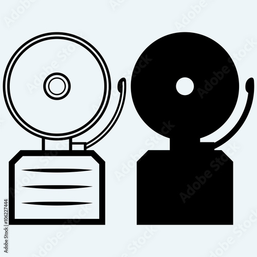 Alarm bell. Isolated on blue background. Vector silhouettes