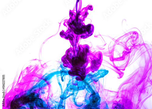 colored ink are swirling underwater