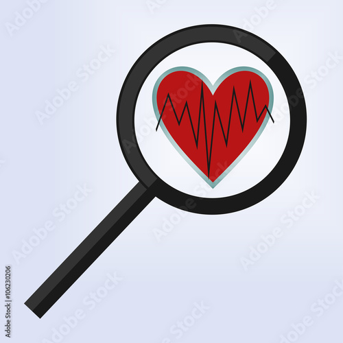 the magnifying glass is positioned on a heart 