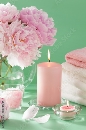 bath and spa with peony flowers candles towels