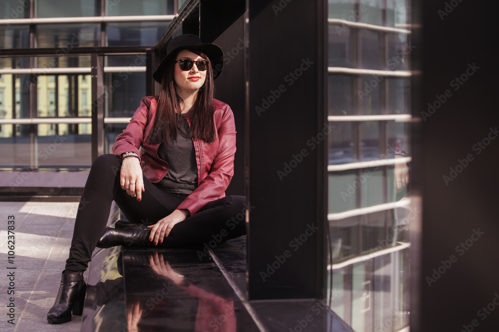 Fototapeta premium Young beautiful woman enjoying in the city