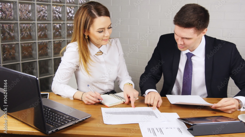 Business people Having Meeting Around Table In Modern Office Business people Having Meeting Around Table In Modern Office