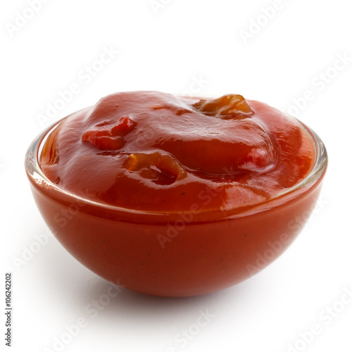 Small glass condiment bowl of tomato and red chilli pepper salsa