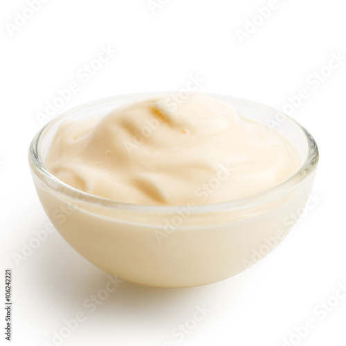 Small glass condiment bowl of mayonnaise. Isolated.