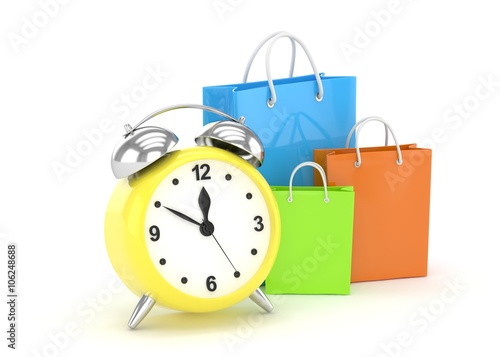 alarm clock and shopping bag (time to buy concept)