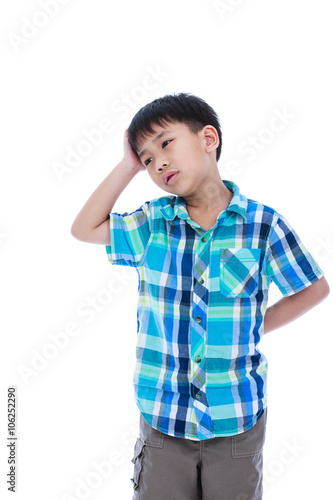 Attractive 7 year old boy making thinking expression. Isolated 