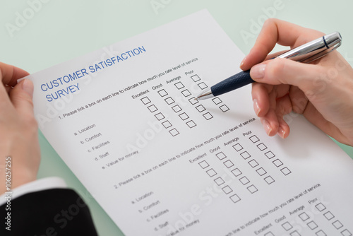 Woman Filling Customer Satisfaction Form