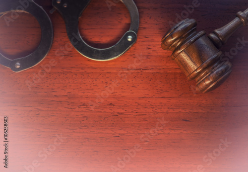 Legal law concept image - gavel and handcuffs 