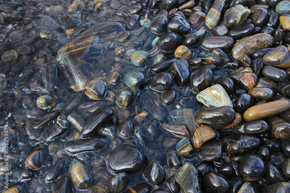 Polished rocks on shallow lake Polished rocks on shallow lake