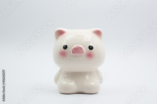 cute pink piggy bank isolated on white background