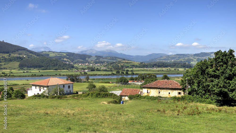 Cantabria landscape with field and a small village. Spain.