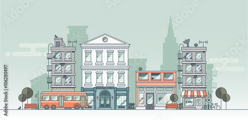 Small flat urban landscape with buildings and a bus.