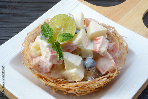 fruit salad in taro basket