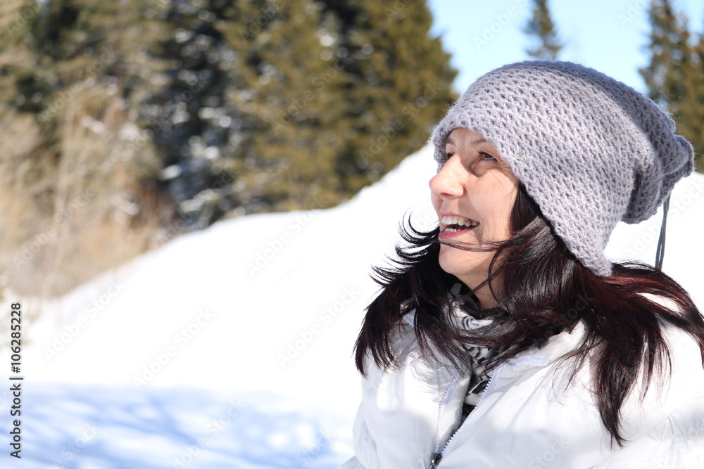 Smiling woman in the snow mountain Smiling woman in the snow mountain