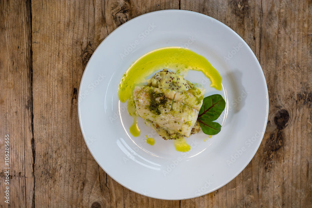 Haddock with whole grain mash and garlic parsley butter from above. French restaurant prepared fish dish with mashed potato
Haddock with whole grain mash and garlic parsley butter from above. French restaurant prepared fish dish with mashed potato