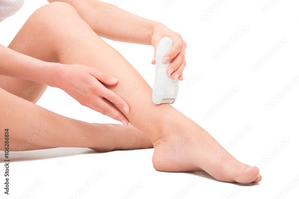 Beautiful female legs with the epilator Beautiful female legs with the epilator