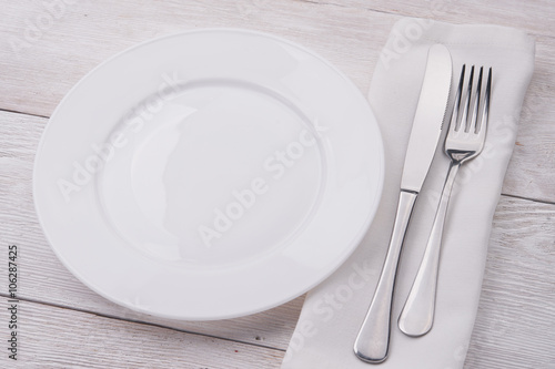 white plate  knife and fork