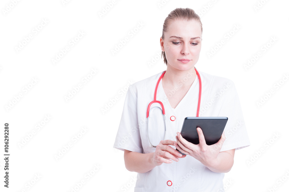 Confident and modern doctor woman using tablet pc Confident and modern doctor woman using tablet pc