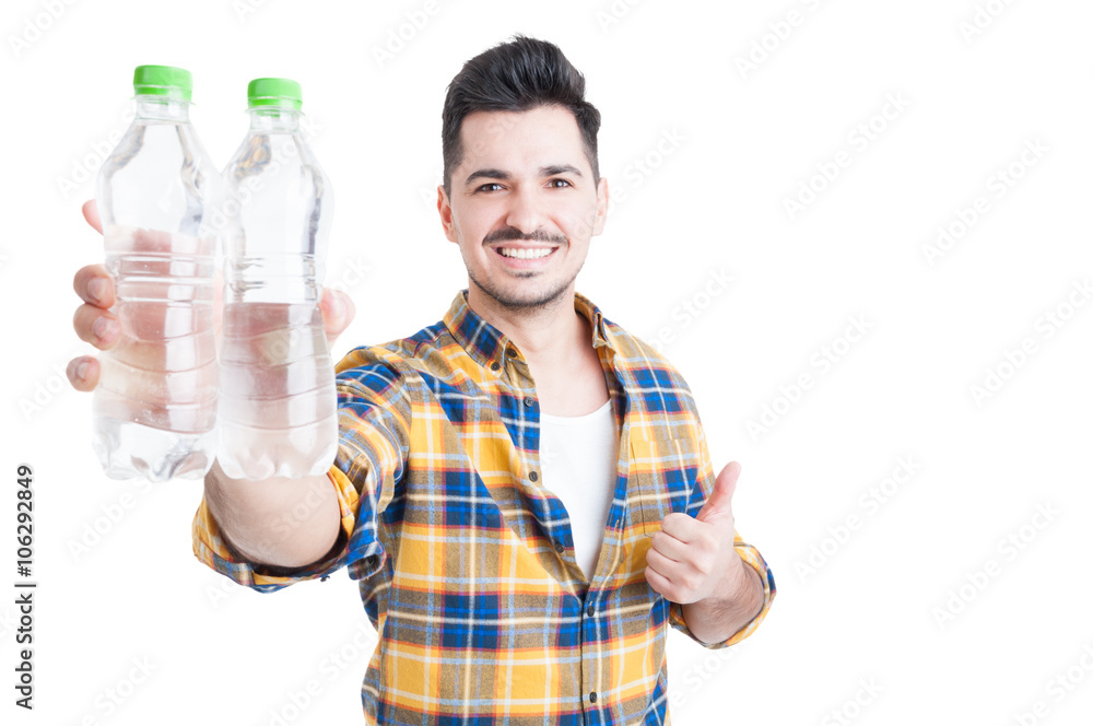 Handsome smiling man thumb-up and encourage water consumption Handsome smiling man thumb-up and encourage water consumption