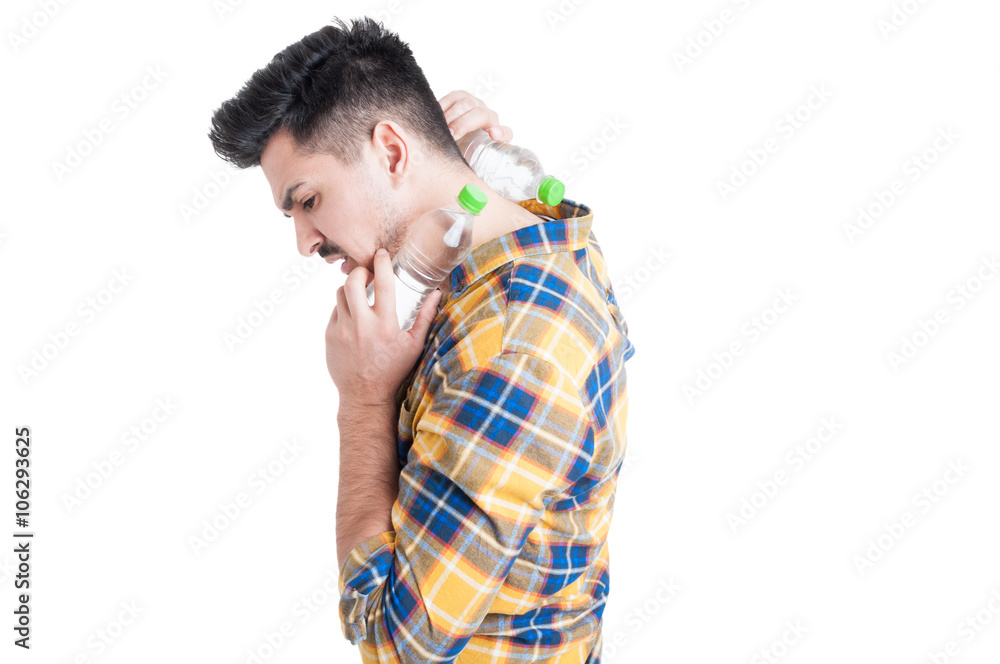 Attractive male model with two bottles of cold water Attractive male model with two bottles of cold water