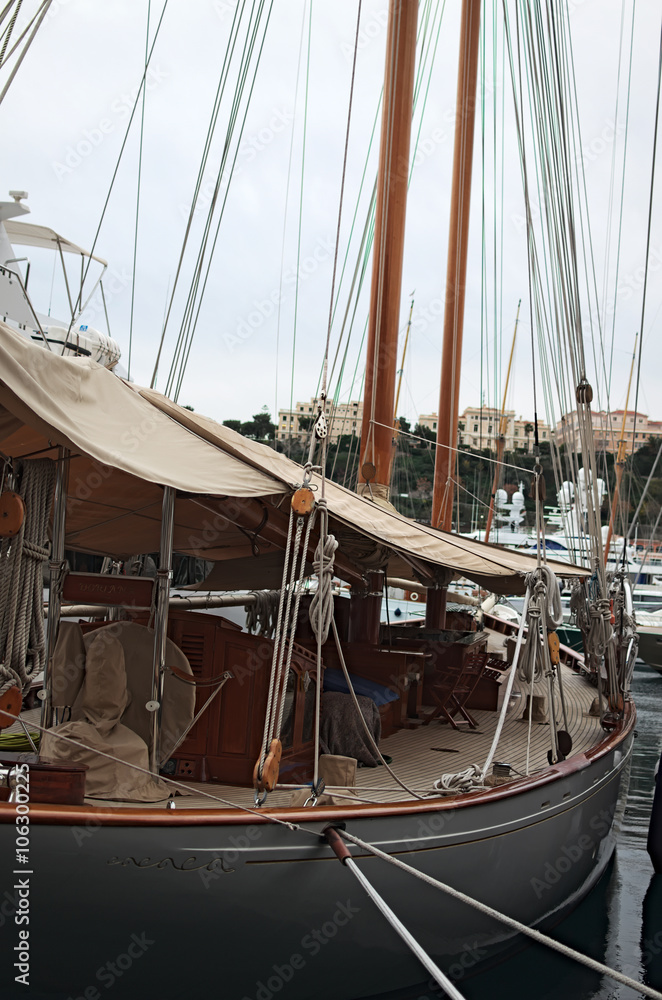 Obraz premium Early morning in the port of Monaco. Beautiful yacht is looking forward to the next exit to the sea