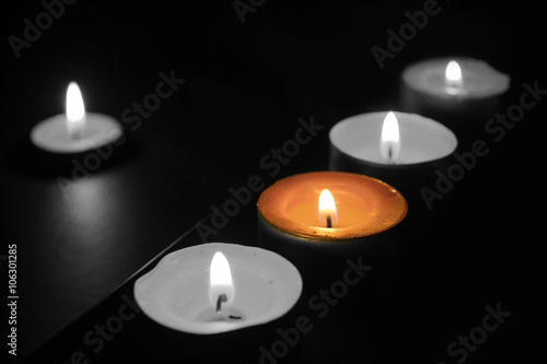 Burning candles in the dark 