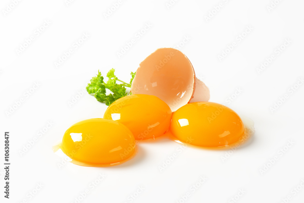 Raw egg yolks - obrazy, fototapety, plakaty 