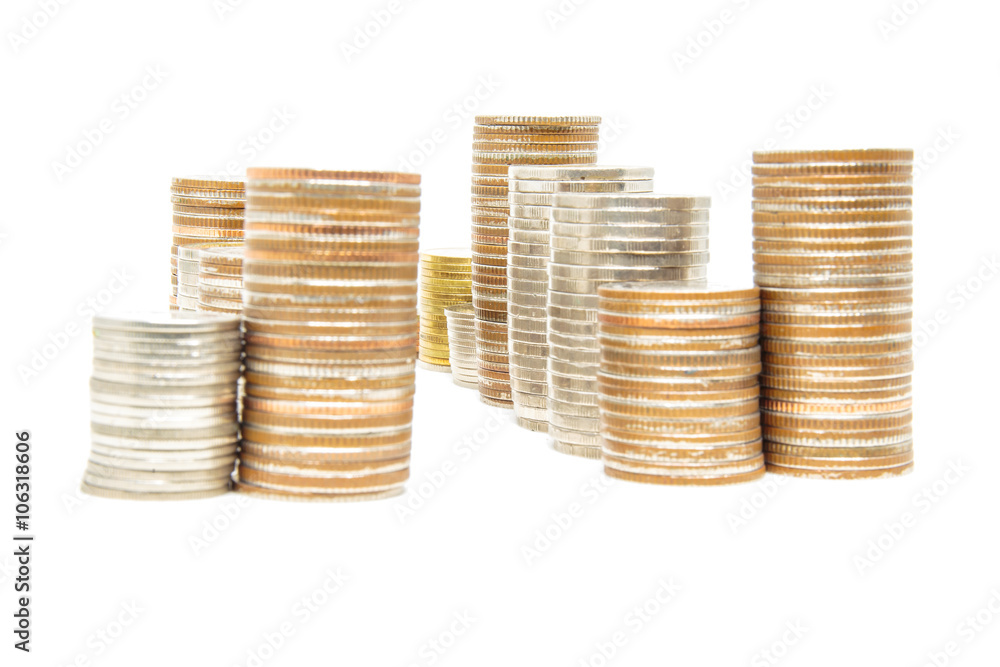 Thailand Baht coins arranged as tower on a white background. Selective focused on center image. Thailand Baht coins arranged as tower on a white background. Selective focused on center image.
