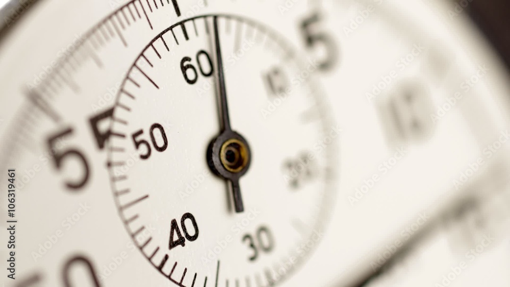 Stopwatch time lapse. A stop watch clockwork clock face timelapse with selective focus and limited depth of field. Stopwatch time lapse. A stop watch clockwork clock face timelapse with selective focus and limited depth of field.