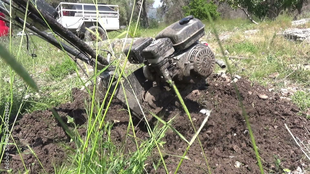 Close up shot of a tillage cultivator in operation. Clip with audio. Close up shot of a tillage cultivator in operation. Clip with audio.