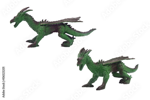 Isolated dragon toy photo. Isolated dragon toy side and angle view. © syberianmoon
