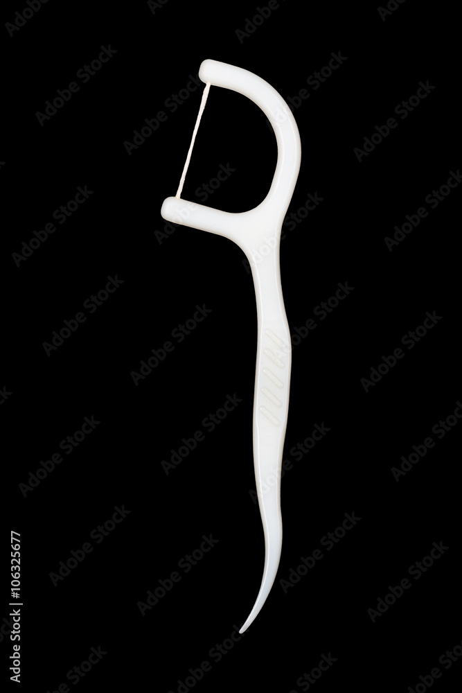 Fototapeta premium One dental floss stick isolated on white