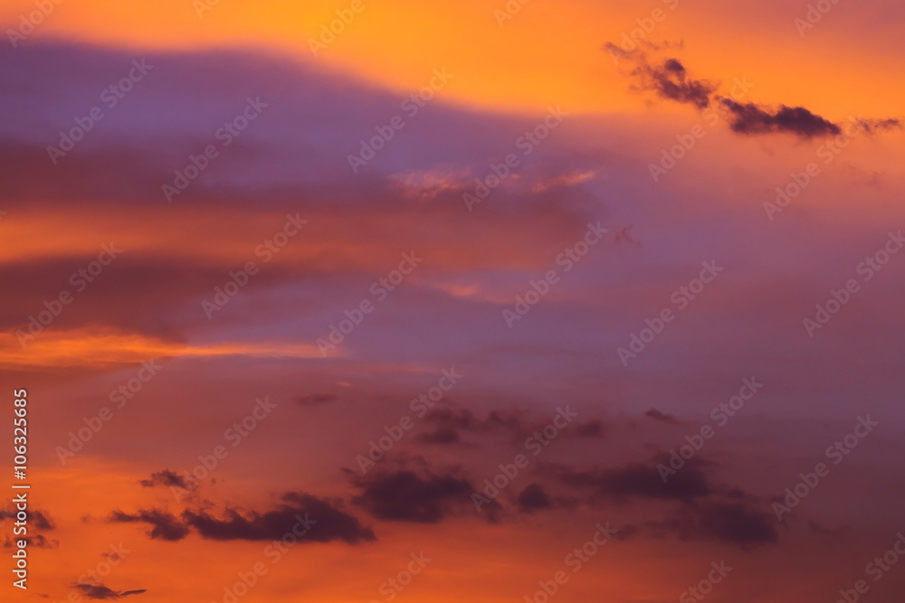 Fototapeta premium colorful dramatic sunset sky with orange cloud, twilight sky