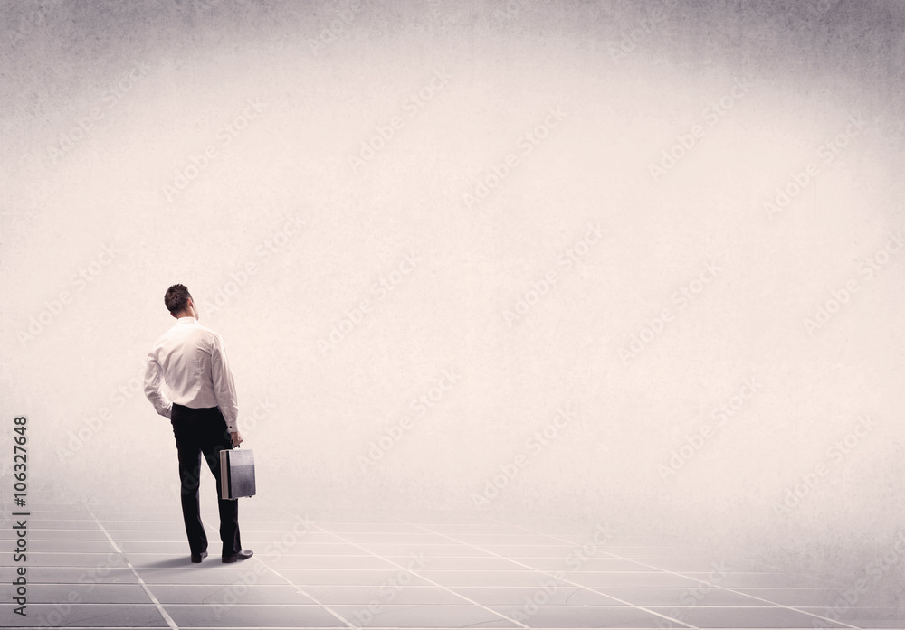 Business person standing in empty space Business person standing in empty space