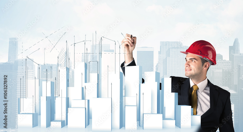 Businessman drawing skyscrapers