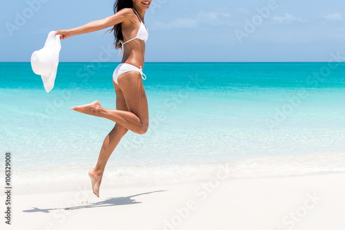 Foto Beach ready bikini body - sexy slim legs and toned thighs and butt