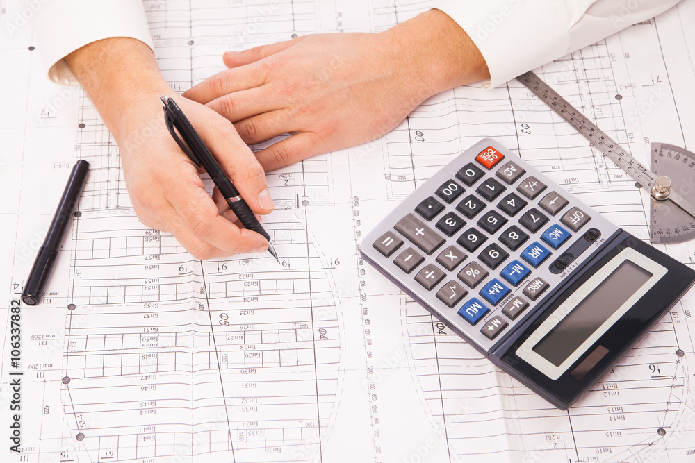 graph on background of businessman hands with pens graph on background of businessman hands with pens