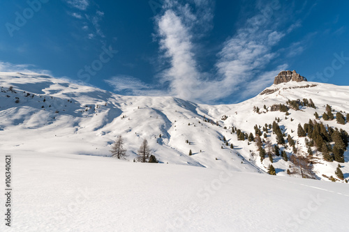 Winter ski area Ciampac in Dolomites, Italy, with Crepa Neigra mountain in the background
