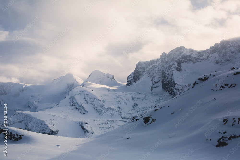 Beautiful wide snow panoramic view of Monte Rosa, mountain massif in the eastern part of the Pennine Alps, between Switzerland and Italy, with peaks Dufourspitze and Lyskamm, near Matterhorn Mountain