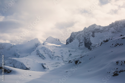 Beautiful wide snow panoramic view of Monte Rosa, mountain massif in the eastern part of the Pennine Alps, between Switzerland and Italy, with peaks Dufourspitze and Lyskamm, near Matterhorn Mountain