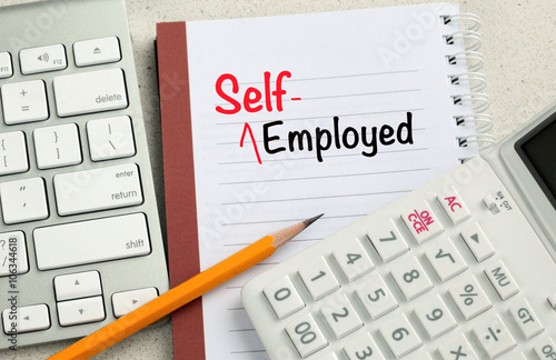 concept of self-employed with desk background