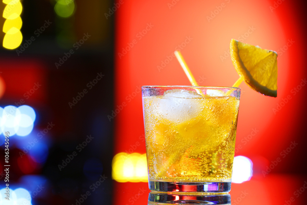 Glass of cocktail on bar background Glass of cocktail on bar background
