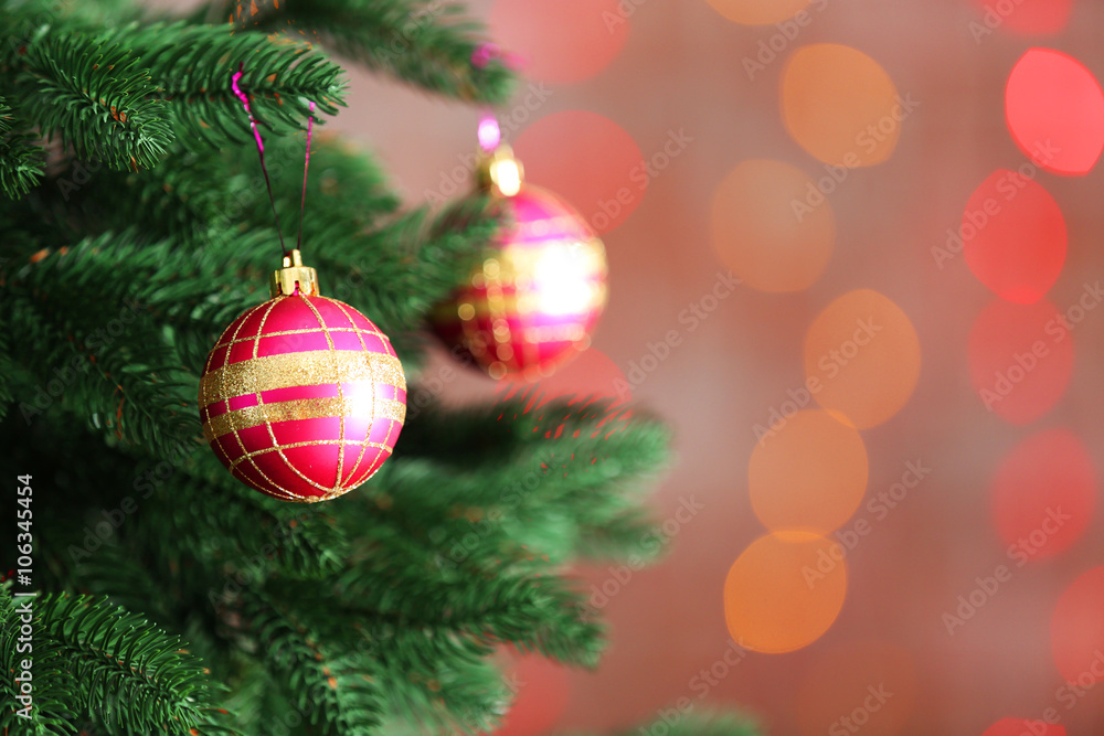 Christmas tree with decor on bright background, closeup Christmas tree with decor on bright background, closeup